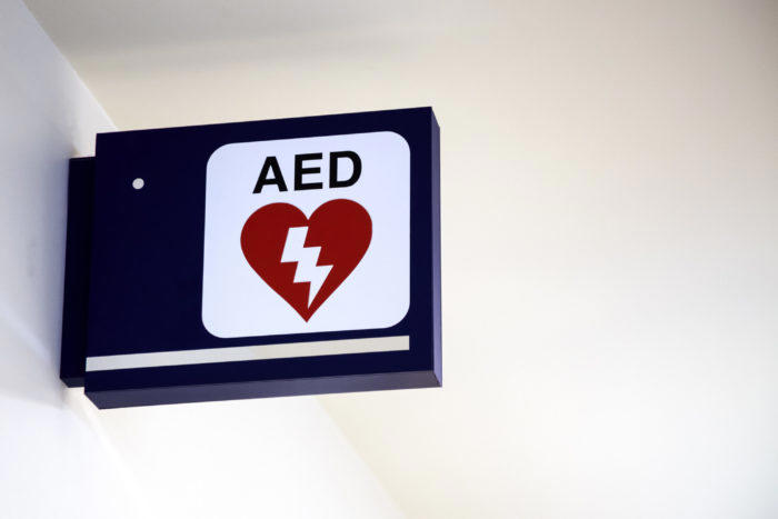 AED sign in office building