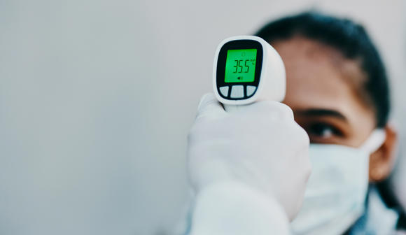 Temperature screening a woman