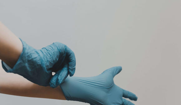 Putting on gloves PPE