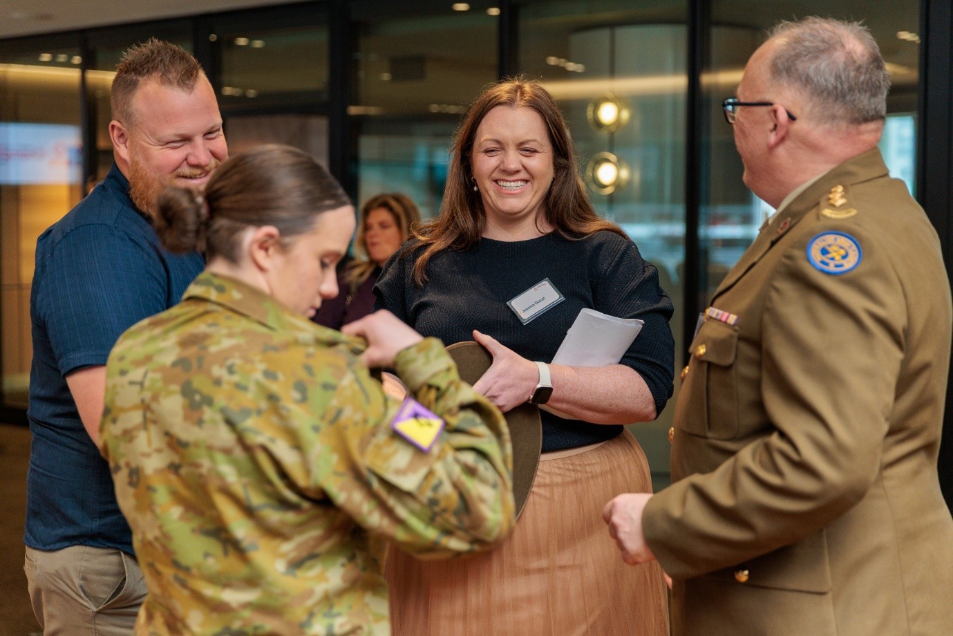 Alice gets herself prepared for the award ceremony accompanied by her parents and LT COL (Australian Army Cadet) Stephen Livingston who nominated her for this award