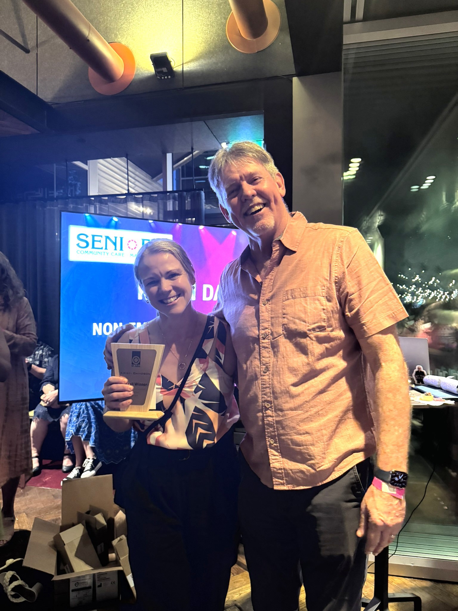 Kristi receives the Staff Excellence Award from CEO Gordon Botwright